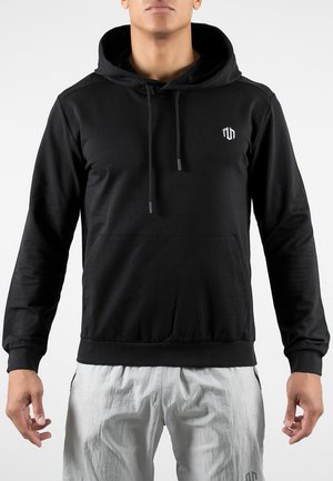 Black hoodie made of soft fabric, featuring a front kangaroo pocket, drawstring hood, and a subtle logo on the chest.