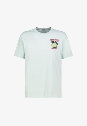 White short-sleeve T-shirt with small green apple graphic and red text "Fresh Fruit Stay Healthy Crisp Apples" on the left chest.