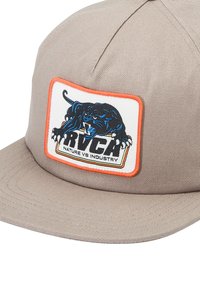 Gray cap with a structured design. Features an embroidered black panther graphic on a white patch, bordered by orange stitching.
