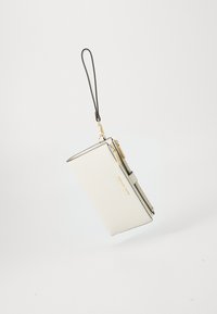 White textured wallet with gold hardware, zip closure, and a wrist strap, featuring a sleek rectangular shape and subtle brand name detail.