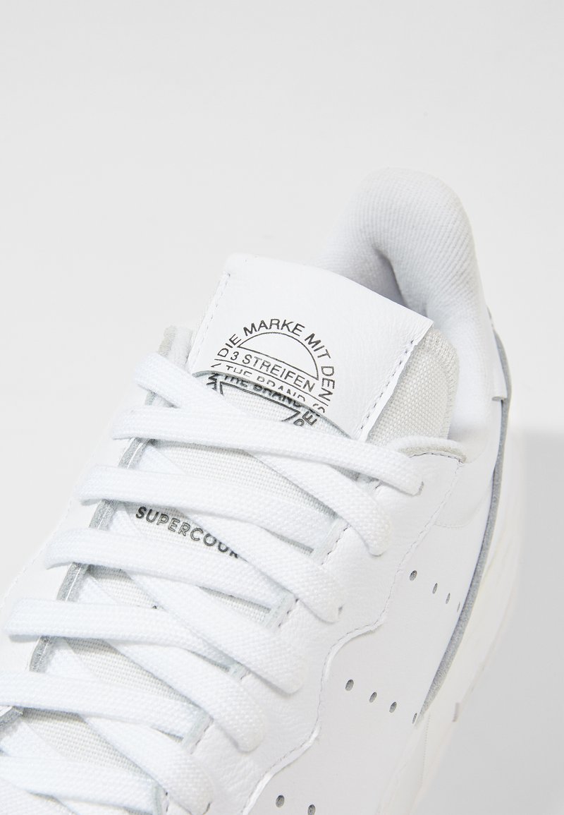 adidas supercourt triple white