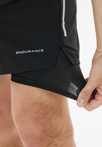 Endurance 2-IN-1 - Urheilushortsit - black
