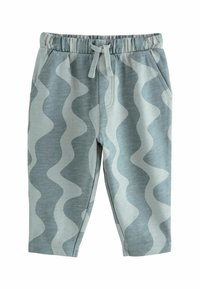 Helle blaue Baumwollhosen mit einem welligen weißen Muster, elastischem Bund und funktionalem Kordelzug. Mit Seitentaschen und weicher Textur.