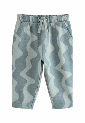 Pantalones de algodón azul claro con un patrón ondulado blanco, cinturilla elástica y cordón funcional. Presenta bolsillos laterales y una textura suave.