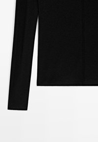 Black long-sleeve top made of a soft fabric, featuring a simple design, flat seams, and a straight cut at the hem and cuffs.