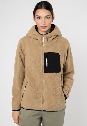 Beige Fleece-Hoodie mit einer schwarzen Reißverschlusstasche auf der Brust. Verfügt über eine weiche Textur, einen vollen Reißverschluss vorne und eine verstellbare Kapuze.