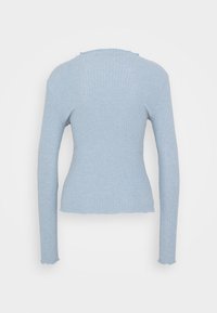 Light blue, ribbed long-sleeve top with a fitted silhouette. Raw edges and a round neckline detail the design.