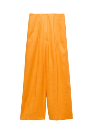 Bukser med vide ben og høj talje i lyst orange stof med subtil tekstur, vist mod en hvid baggrund.