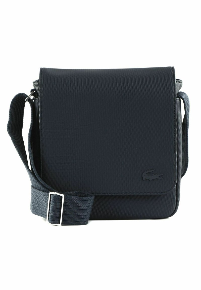 Borsa a tracolla blu scuro realizzata in materiale sintetico testurizzato. Presenta una chiusura a patta, una tracolla regolabile e un dettaglio del logo impresso.