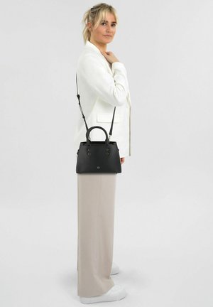 Black textured handbag with dual top handles and a detachable shoulder strap. Features decorative hardware and a structured silhouette.