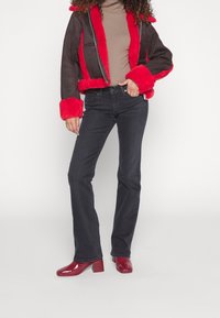 Levi's® Vaqueros bootcut - black denim