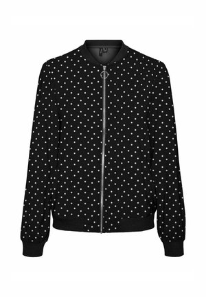 Schwarze Bomberjacke mit weißen Dots, Reißverschluss vorne, geripptem Kragen und Bündchen sowie Seitentaschen. Hergestellt aus glattem, leichtem Stoff.