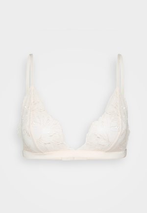 Krajková trojúhelníková podprsenka v jemné béžové barvě, s květinovou výšivkou, nastavitelné ramínka a hladký pás. Lehká s jemnou texturou.