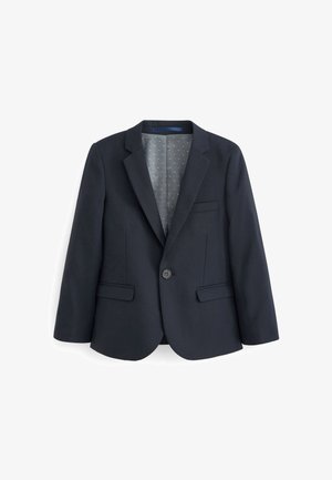 Blazer azul marino oscuro de un solo botón con solapas con muesca, dos bolsillos con solapa, un bolsillo en el pecho y forro gris con lunares.