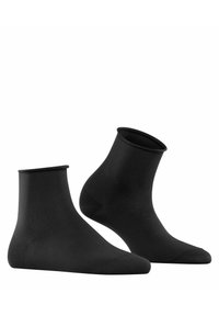 Calcetines negros hasta el tobillo, hechos de una tela suave, con un ajuste ceñido, puño acanalado, punta sin costuras y textura uniforme en todo su tejido.