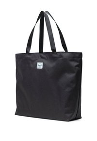Borsa a tracolla nera in tessuto con doppie maniglie piatte, forma quadrata e piccolo logo brandizzato vicino alla parte superiore. Texture liscia e design minimale.