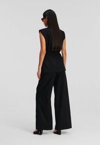 KARL LAGERFELD WIDE-LEG - Broek - black