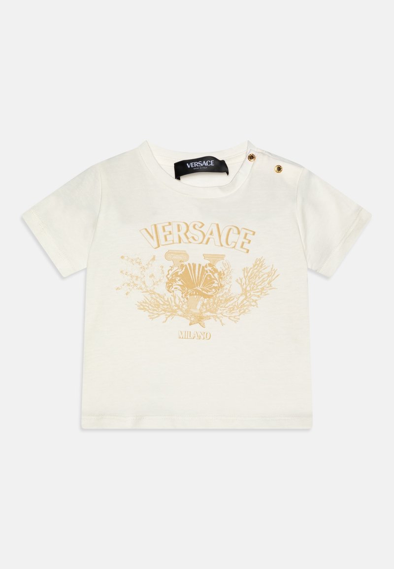 Kremfarvet kortærmet småbørnsskjorte med gyldent Versace-logo, ornamenteret design, teksten "Milano" og to gyldne trykknapper på skulderen.
