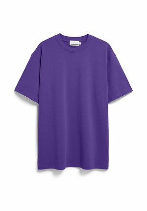 T-shirt violet uni à manches courtes avec col rond, présenté à plat sur un fond blanc.