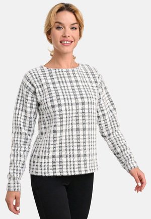 White and black checked sweater with long sleeves, round neckline, and a textured fabric. The design features a small plaid pattern throughout.