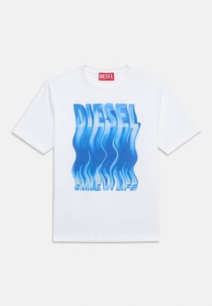 White short-sleeve T-shirt with a blue distorted "DIESEL" text and "SMILE IN LIFE" phrase below the graphic on the front.