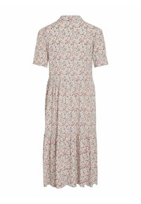 Kwiatowa sukienka z krótkim rękawem i kołnierzykowym dekoltem. Posiada falbaniaste spódnice oraz lekką, teksturowaną tkaninę w pastelowych kolorach.