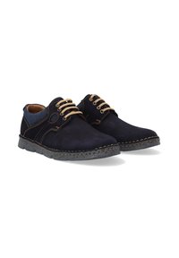 Navy blue suede shoes with a textured upper, beige laces, contrast stitching, and a grey rubber sole featuring a tread pattern.
