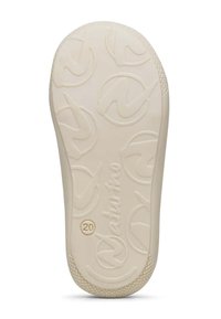Suela de zapato de goma color beige claro con agarre texturizado. Presenta diseños de patrones circulares y un logo en relieve. Talla indicada como 20.