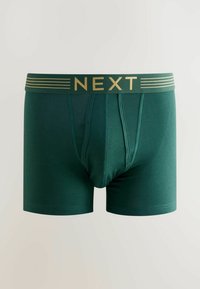 Dunkelgrüne Herren-Boxershorts mit einem goldenen "NEXT"-Logo am Bund und kontrastierender Naht. Das Material ist weich und hat ein enges Design.