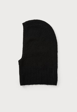Black knit beanie with ribbed texture and elongated shape, featuring a snug fit at the bottom. Classic monochrome design.