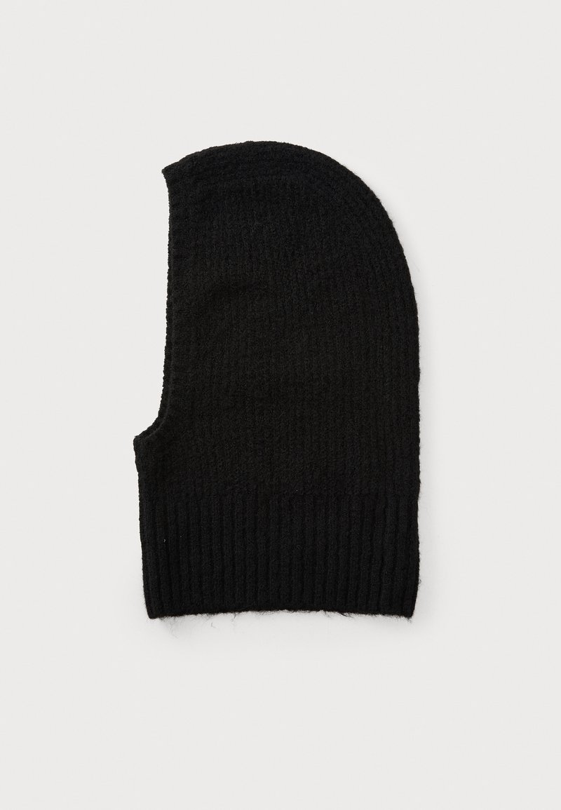 Black knit beanie with ribbed texture and elongated shape, featuring a snug fit at the bottom. Classic monochrome design.