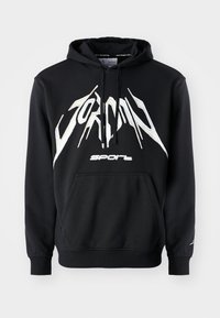 Felpa nera con cappuccio in cotone, dotata di tasca frontale a marsupio. Presenta il logo bianco "JORDAN SPORT" e cappuccio con cordini. Tessuto testurizzato.