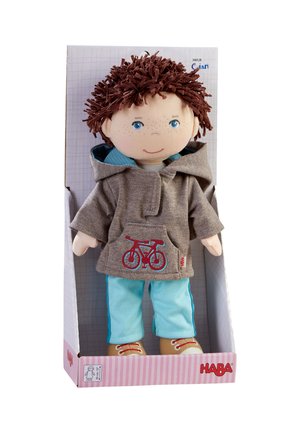 Soft doll with brown curly hair, wearing a gray hoodie featuring a red bicycle design, light blue pants, and beige shoes.