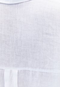 OVERSIZE MIT BRUSTTASCHE - Blouse - white