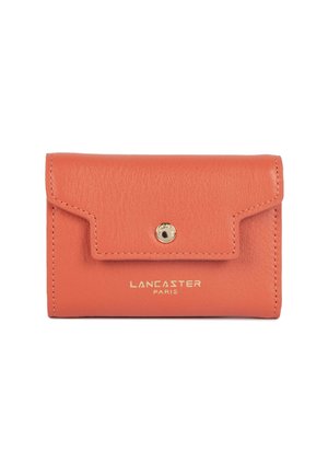 Orange leather wallet with a textured finish, featuring a flap closure, gold hardware, and "LANCASTER PARIS" embossed in gold on the front.