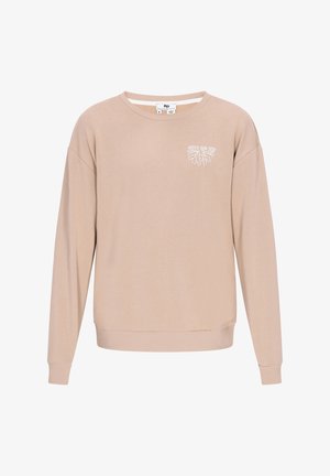 Beżowy sweter z długim rękawem, z żeberkowymi mankietami i okrągłym dekoltem. Ma mały biały nadruk "Roots Run Deep" na klatce piersiowej.