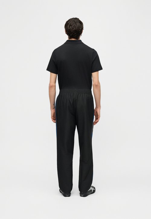 PUMA BMW MMS LIFESTYLE - Tracksuit bottoms - black — photo 5