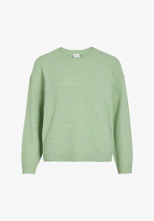 Jersey de punto verde claro con cuello redondo, hombros caídos y puños y dobladillo acanalados. Textura suave con un sutil patrón melange.