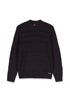 Sort strikket sweater med strukturerede horisontale mønstre og en ribbet rund hals. Har Volcom-logoet nederst i hvid.
