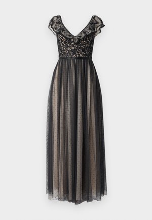 Robe de soirée longue noire avec une superposition en tulle à pois, corsage en dentelle florale, décolleté en V froncé et manches courtes sur doublure nude.
