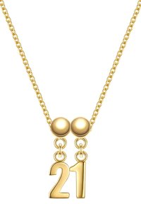 Guldhalsband med kedjedesign som har två sfäriska accenter och en hängande "21"-numerisk berlock. Slät, reflekterande yta.