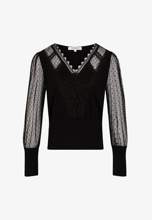 Haut noir avec un col en V, des détails en dentelle et des manches bouffantes en tulle à pois noirs. Tissu doux avec une taille ajustée et des longues manches.