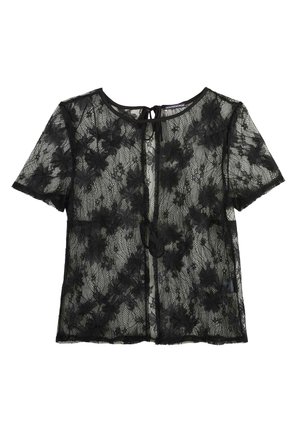 Blouse noire en dentelle à manches courtes avec motif floral, encolure ronde, dos avec ouverture en forme de goutte d'eau et fermeture par nouage.