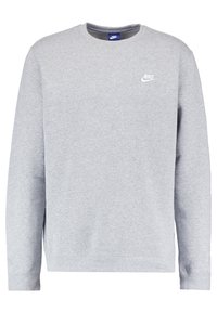 Harmaa collegepaita, valmistettu puuvillasekoitekankaasta, jossa on pyöreä pääntie, pitkät hihat ja pieni valkoinen Nike-logo vasemmassa rinnassa.