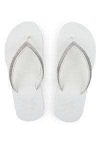 White flip-flops with a textured footbed and a silver rhinestone-accented strap in a V shape. Smooth surface with floral logo detail.
