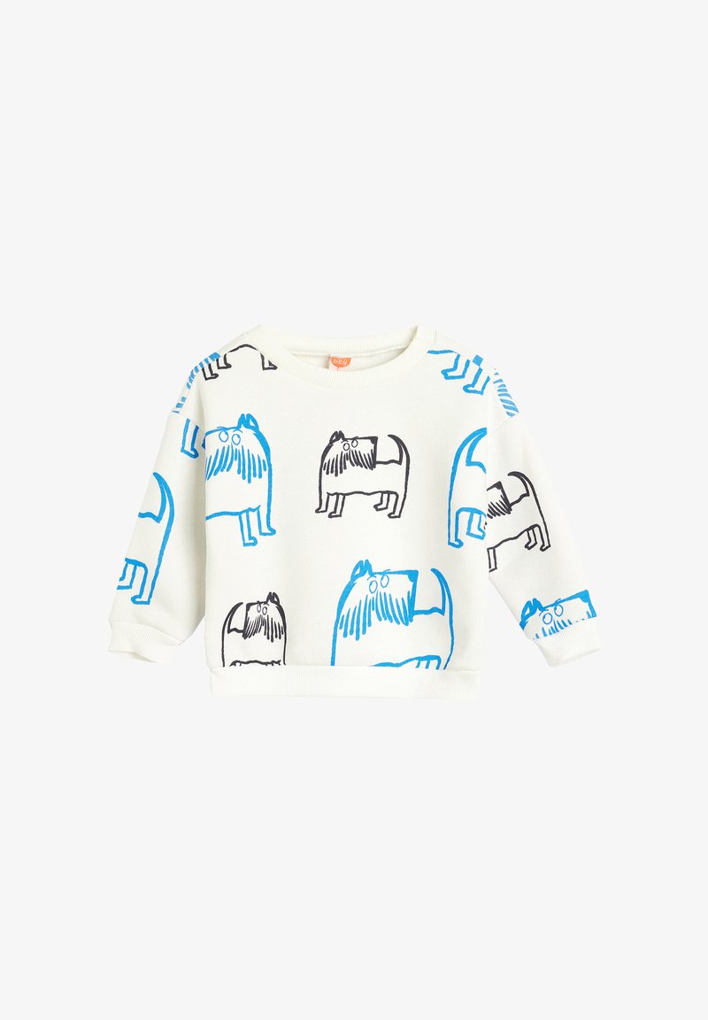 Sudadera blanca con estampados de perros azules y negros, cuello redondo y mangas largas. Tejido suave con puños y dobladillo acanalados.