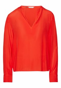 Blusa rossa a maniche lunghe con scollatura a V, realizzata in tessuto leggero e liscio, con una vestibilità comoda e maniche con polsini.