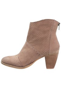 Beige ankle boot with a rounded toe, textured leather upper featuring diagonal stitching, and a stacked heel. Side zipper closure.