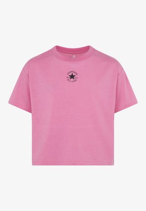 T-shirt court rose à manches courtes avec un petit logo noir Converse All Star centré sous l'encolure.