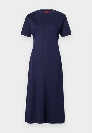 Mørkeblå kortærmet kjole lavet af bomuld, med en lige silhuet, rund halsudskæring og kontrasterende syninger ned foran.